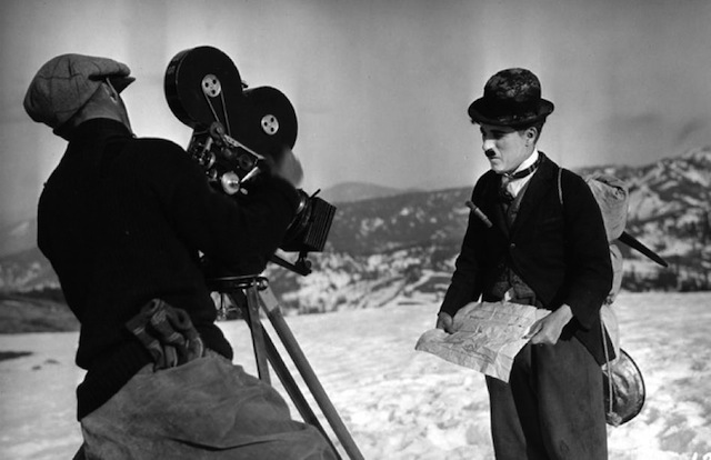 Rollie Totheroh, Chaplin’s favorite cameraman, with Charlie during the film of The Gold Rush, 1925 (Photo: Motion Pictures and Television Photo Archive)