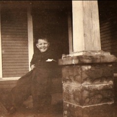 A little rascal at the farm house, 1921