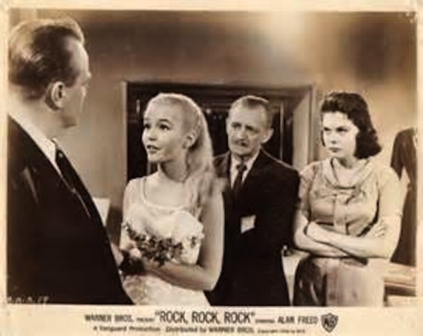 (from left) Jack Collins as Father, Tuesday Weld as Dori, Lester Mack as Mr. Bimble and Jacqueline Kerr as Gloria uncover Dori’s loan scam in Rock, Rock, Rock!